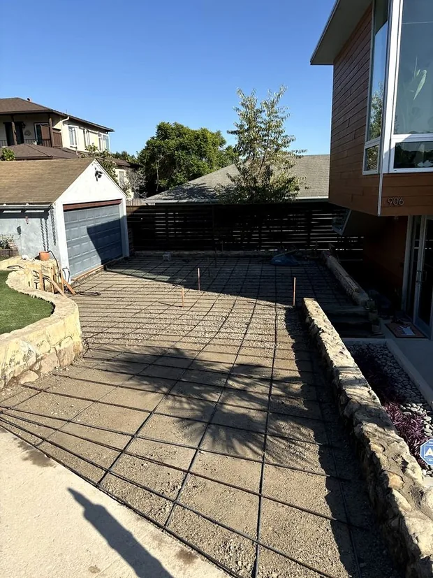 A driveway formed and tied out with a full grid of reinforcing steel